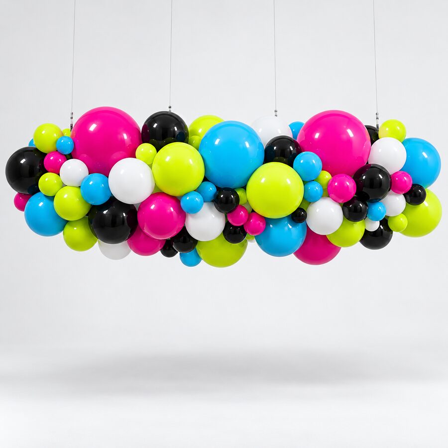 Overhead organic balloon cloud suspended from four thin visible rigging wires.